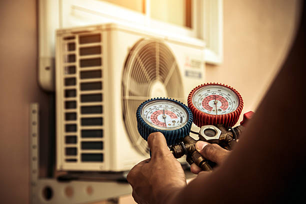 Professional Air Conditioning Service technician working in Eastaboga, AL